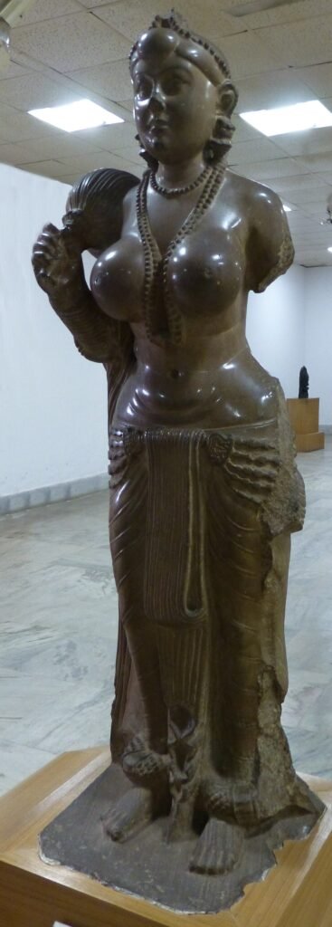 The Didarganj Yakshi, famous for the highly polished stone surface associated with early historic Indian sculpture.