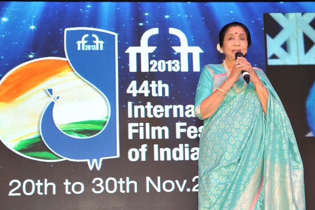 The renowned female singer Asha Bhosle addressing at the inaugural ceremony of the 44th International Film Festival of India (IFFI-2013), in Panaji, Goa on November 20, 2013.jpg — related to The Songs Nobody Else Wanted