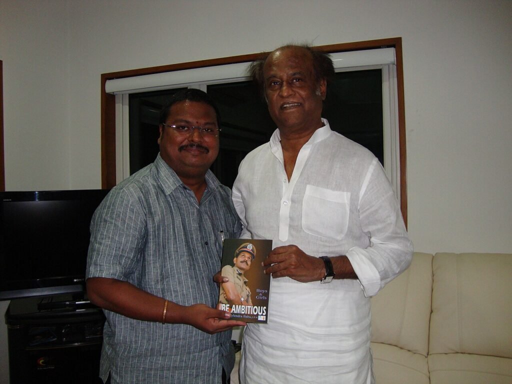 Suresh Prthasarathy with rajinikanth sir.JPG — related to He Takes the Wig Off