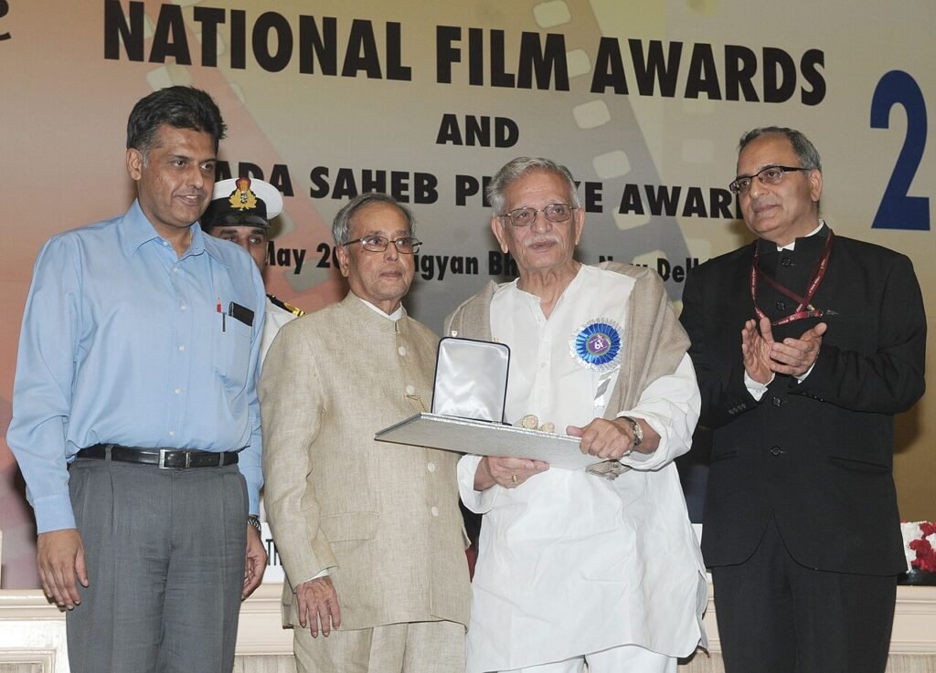 Pranab Mukherjee presenting the Dadasaheb Phalke Award 2013 to Shri Gulzar, the veteran film lyricist, director, screen writer, producer and poet, at the 61st National Film Awards Function.jpg — related to The Script That Stayed Behind