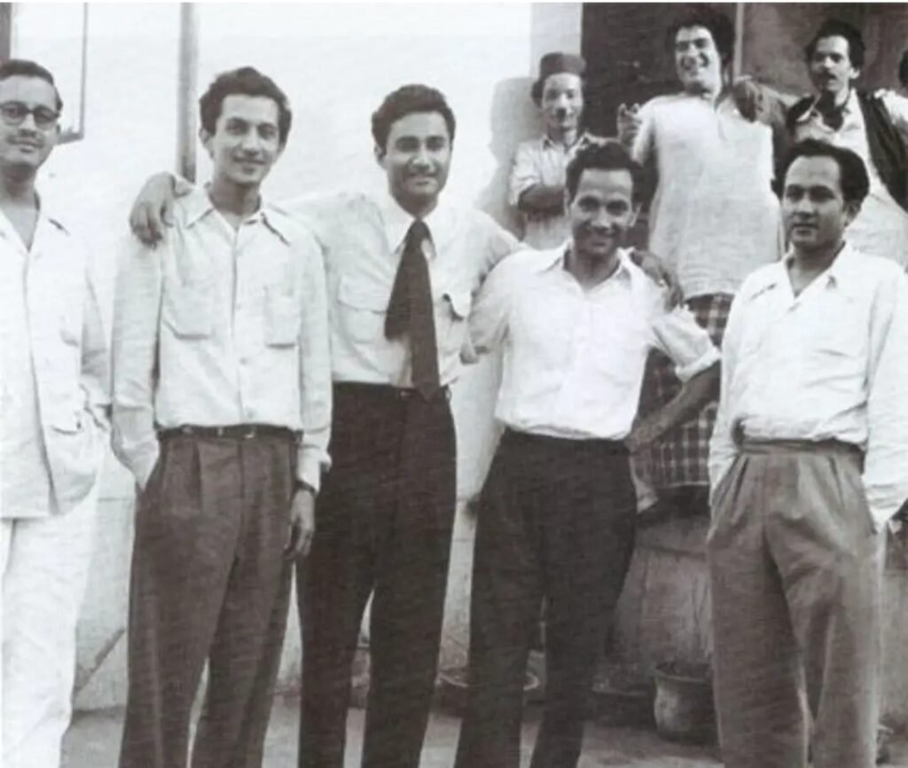 Guru Dutt and Dev Anand with co-workers of Film Jaal.jpg — related to He Stopped Signing His Films