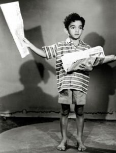 debut as a child artist in the Tamil film Kalathur Kannamma