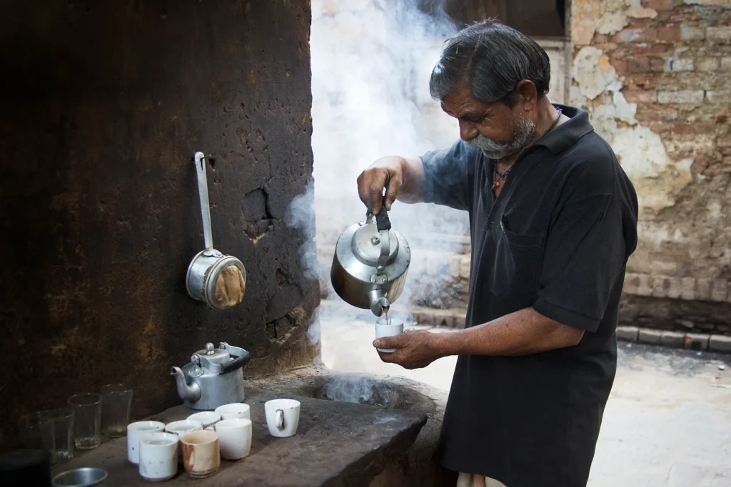 The Cup that was Sold to Us before We Loved it Roadside chai-wallah boiling strong chai with ginger and cardamom