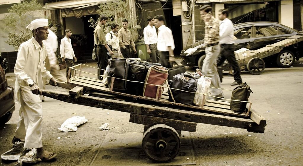 A Mumbai dabbawala with lunchbox deliveries.