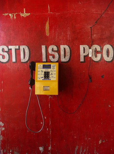 Public call office telephone used for long-distance calling in India.