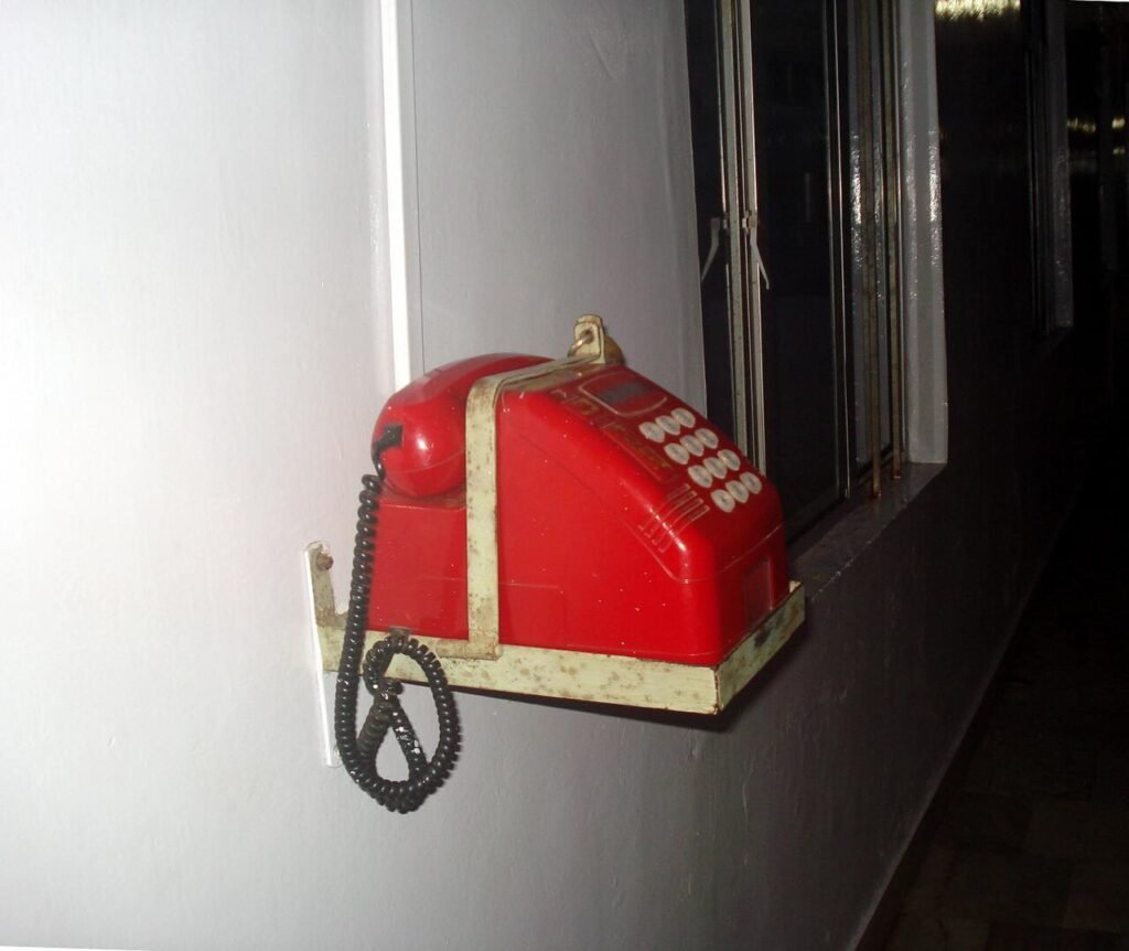 Public call office coin-operated telephone box.